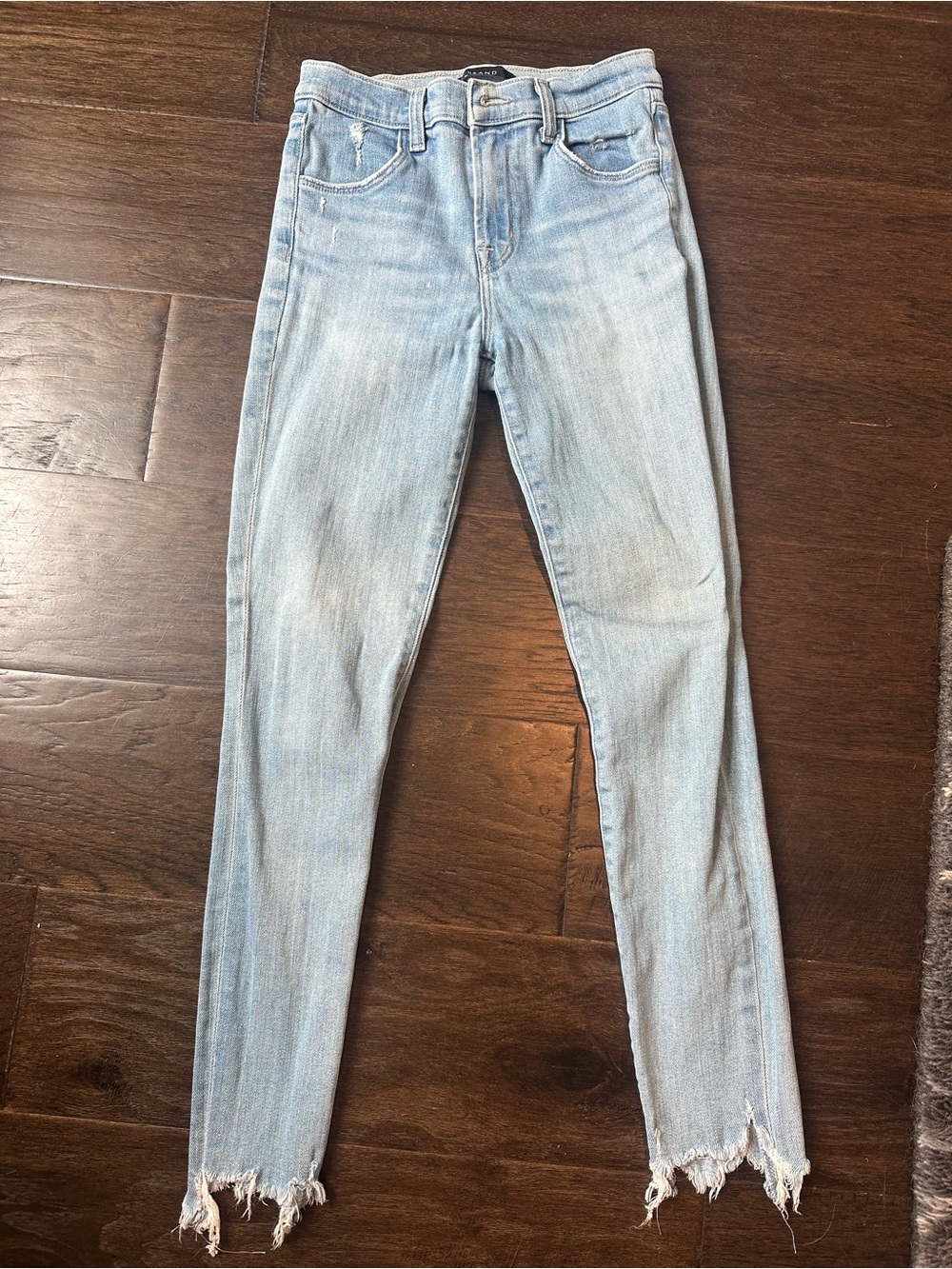 J Brand Light Wash High-Rise Skinny Jeans with Frayed Hem